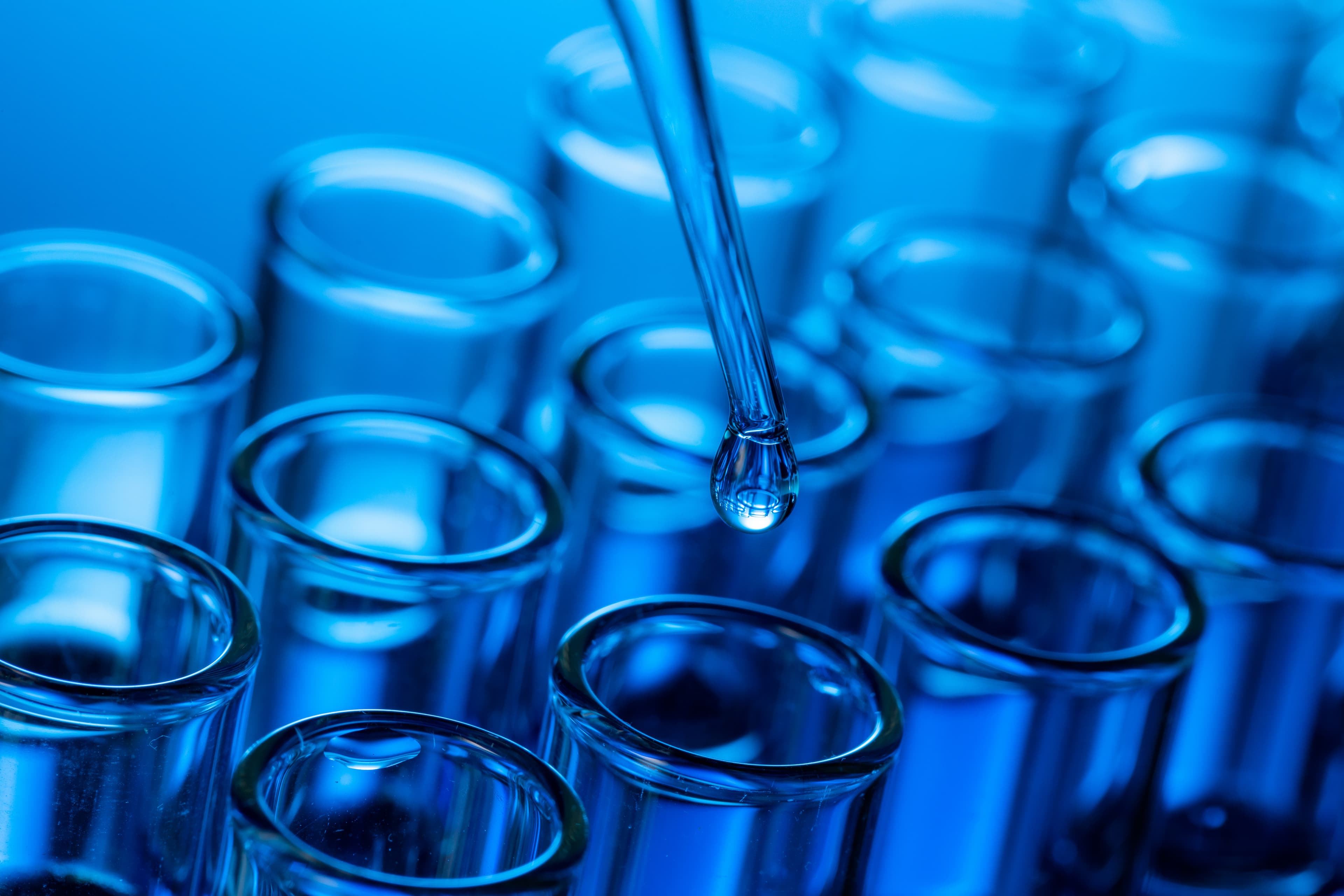 Laboratory glassware with blue liquid